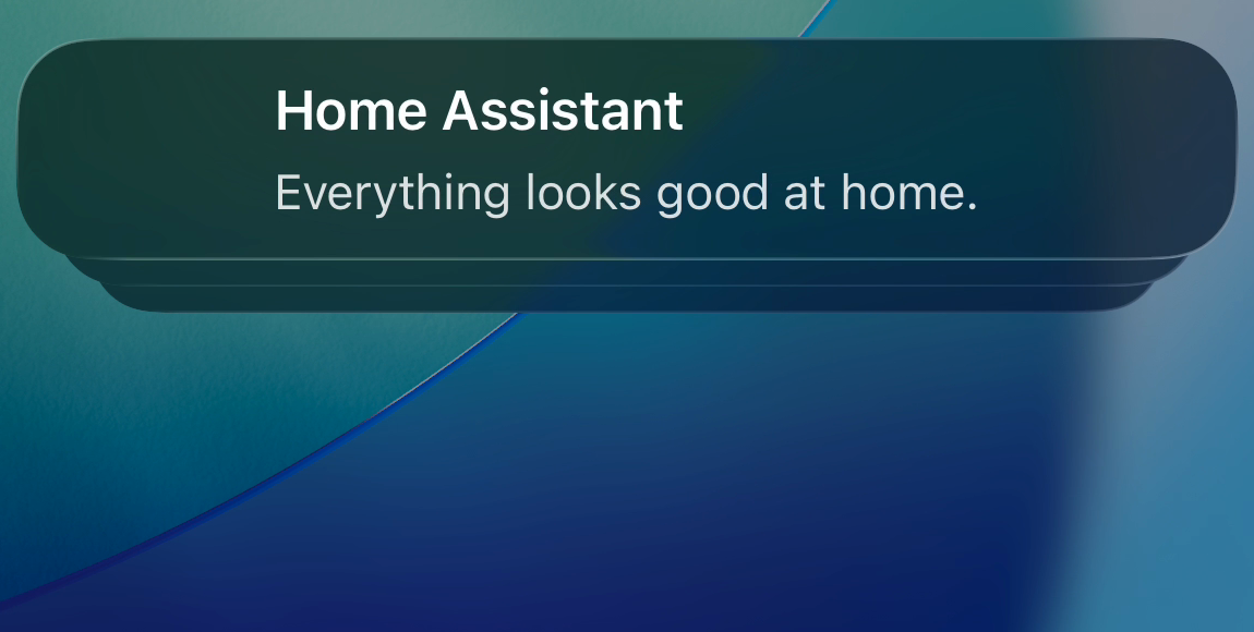 Plain "Home Assistant / Everything looks good at home." Live Activity banner on the iOS Lock Screen